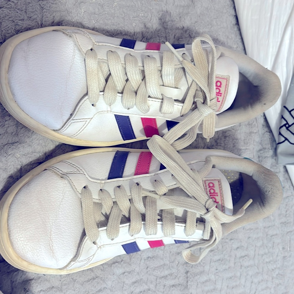 Adidas shoes. There is some marks on the right shoe.